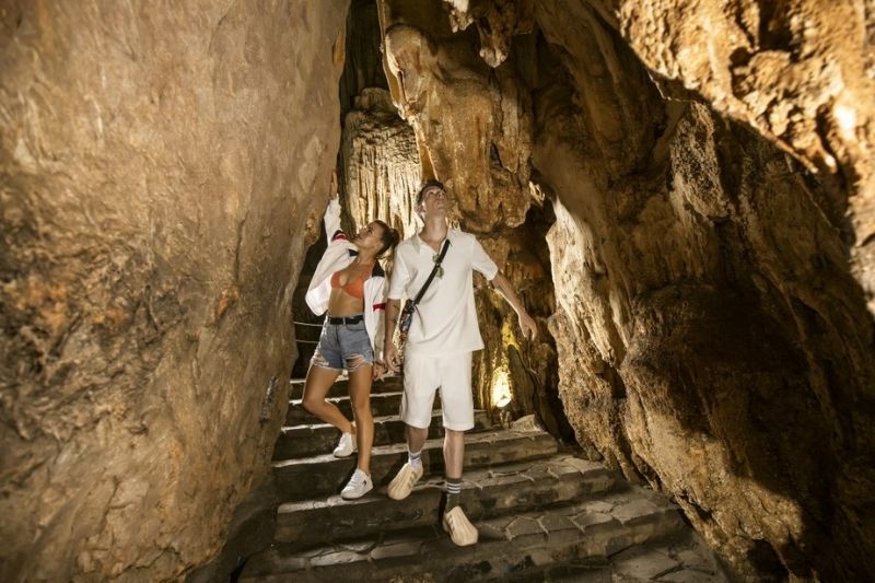 Trekking inside one of the Halong Bay caves